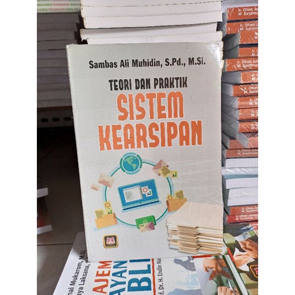 Teori dan Praktek SISTEM KEARSIPAN